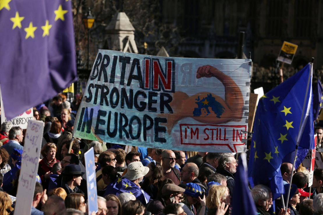 Demonstrators hold a placard that reads, "Britain stronger in Europe," during the march.