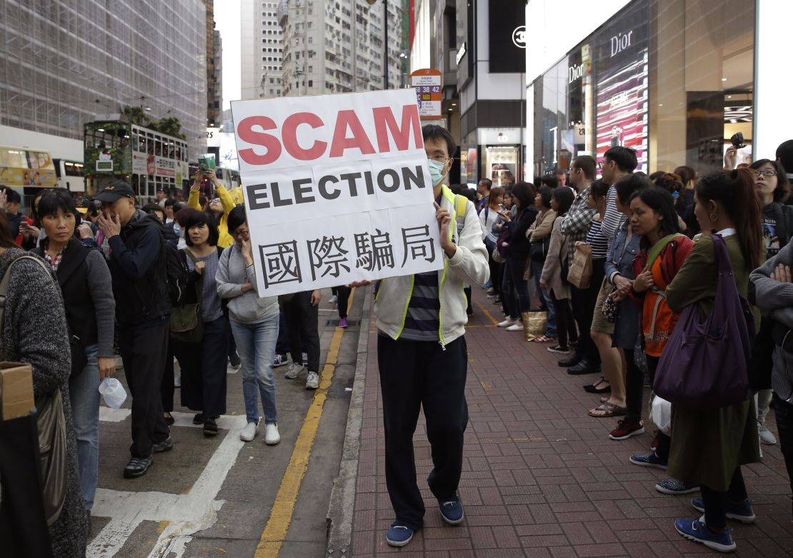 Protesters gathered outside the Hong Kong Convention and Exhibition Center, where votes were being counted.