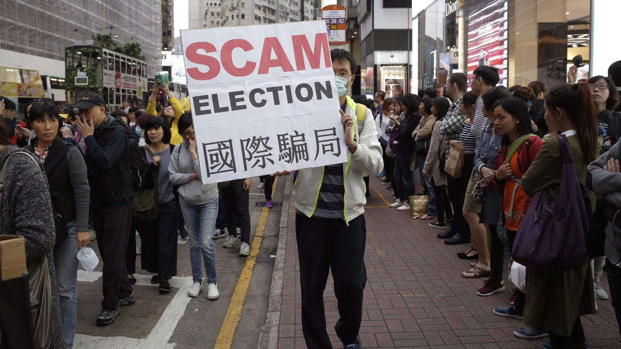 Protesters gathered outside the Hong Kong Convention and Exhibition Center, where votes were being counted.