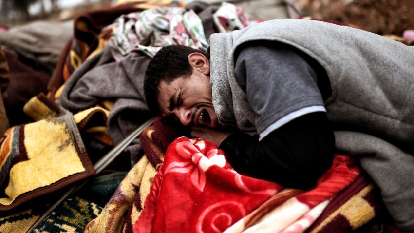 A man breaks down in tears after a deadly airstrike in Mosul on March 17.