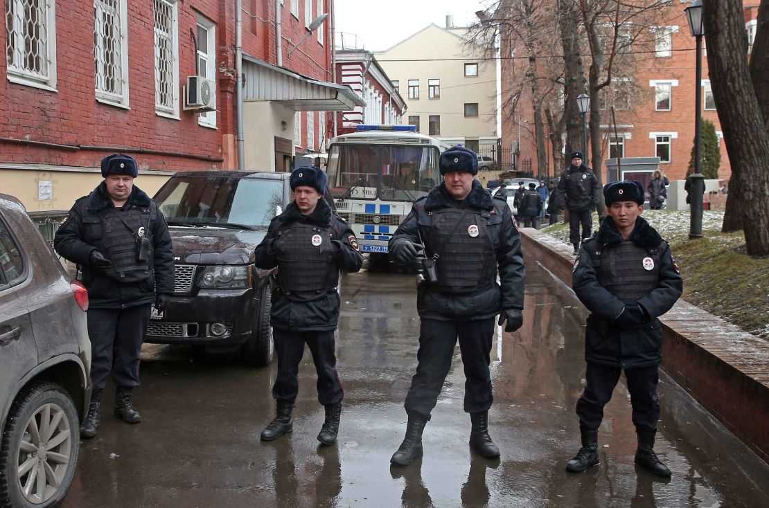 Police outside the court ahead of Navalny's appearance. 
