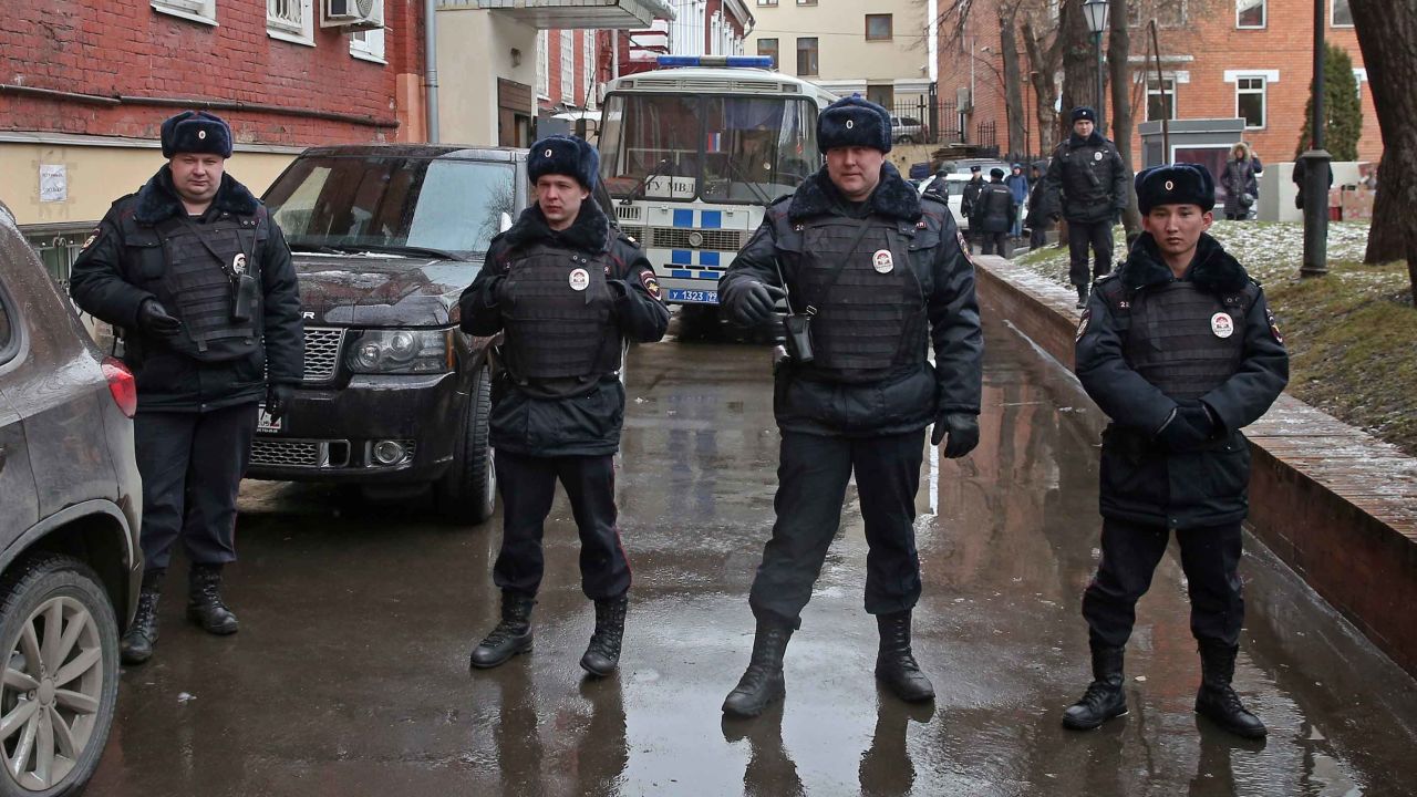 Police outside the court ahead of Navalny's appearance. 