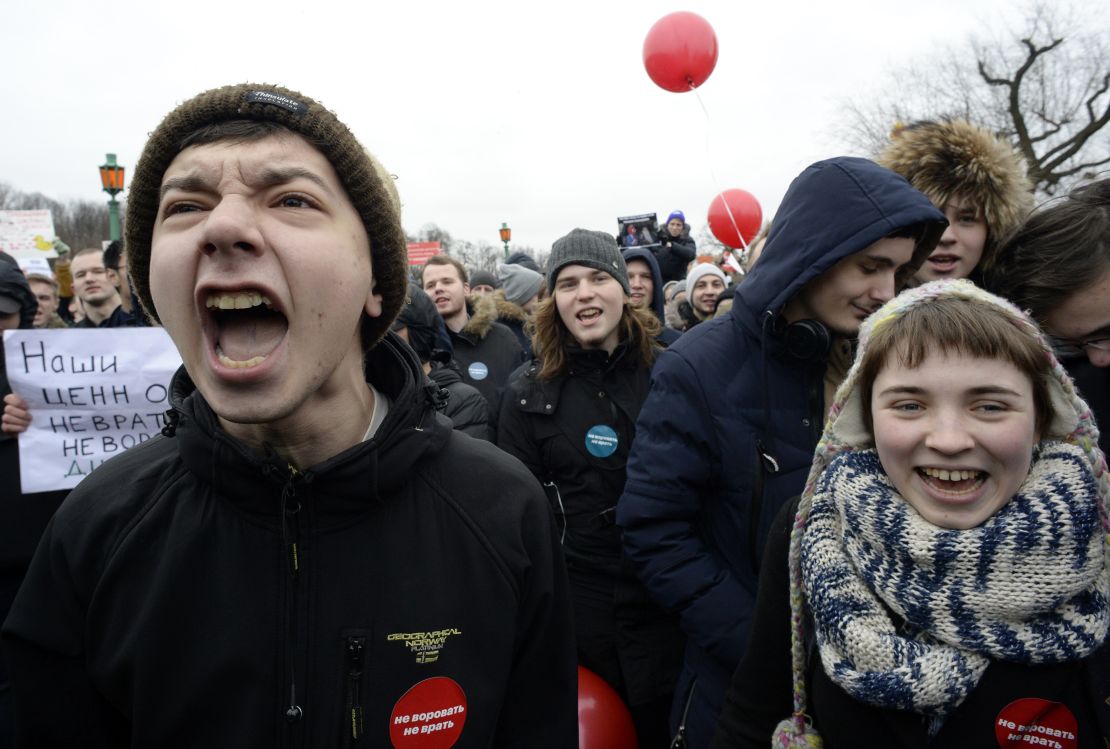 Opposition supporters participate in an anti-corruption rally in central St. Petersburg on March 26, 2017.
