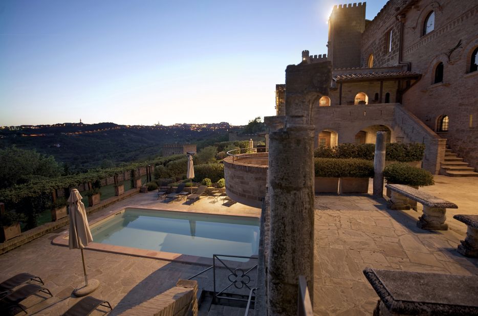 <strong>Castello di Monterone</strong> -- The 11th-century venue and its beautiful outdoor swimming pool overlook the lush valley of Perugia, Italy.  