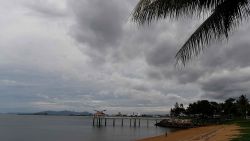 TOWNSVILLE, AUSTRALIA - MARCH 27:  Seen is a general view of grey clouds over one of the Strand beaches with its jetty as residents prepare for Cyclone Debbie on March 27, 2017 in Townsville, Australia. Cyclone Debbie intensified to a category 3 system this morning and is expected to make landfall near Bowen, QLD as a category 4 system tomorrow morning.  (Photo by Ian Hitchcock/Getty Images)