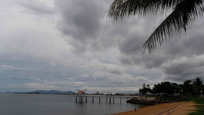 TOWNSVILLE, AUSTRALIA - MARCH 27:  Seen is a general view of grey clouds over one of the Strand beaches with its jetty as residents prepare for Cyclone Debbie on March 27, 2017 in Townsville, Australia. Cyclone Debbie intensified to a category 3 system this morning and is expected to make landfall near Bowen, QLD as a category 4 system tomorrow morning.  (Photo by Ian Hitchcock/Getty Images)