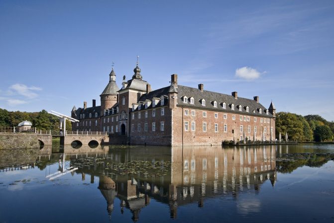 <strong>Parkhotel Wasserburg Anholt -</strong>- A 12th-century castle in Isselburg, Germany, Parkhotel Wasserburg Anholt has a moat and drawbridge.