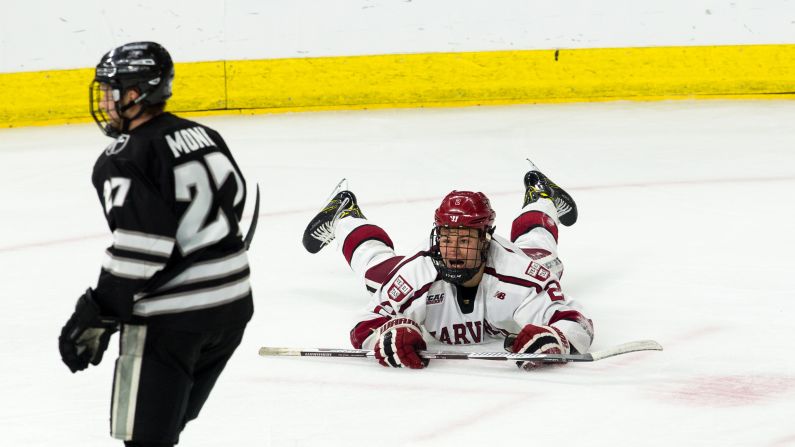 Tyler Moy of the Harvard Crimson celebrates his second goal against the Providence College Friars during the NCAA Division I men's ice hockey East Regional Championship semifinal on Friday, March 24, in Providence, Rhode Island. The Crimson won 3-0. 