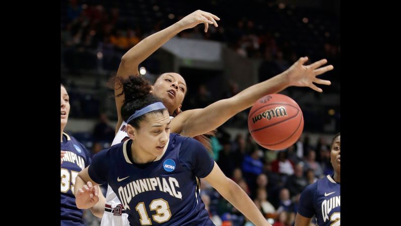 Quinnipiac forward Sarah Shewan and South Carolina's Mikiah Herbert Harrigan compete for the ball during a regional semifinal game in the NCAA Tournament  on Saturday, March 25. South Carolina thumped Quinnipiac 100-58.