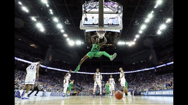 Jordan Bell of the Oregon Ducks <a href="index.php?page=&url=http%3A%2F%2Fbleacherreport.com%2Farticles%2F2699727-oregons-jordan-bell-throws-down-alley-oop-against-michigan" target="_blank" target="_blank">dunks the ball</a> against the Kansas Jayhawks during the NCAA Tournament's Midwest regional on Saturday, March 25. Oregon defeated Kansas 74-60.  
