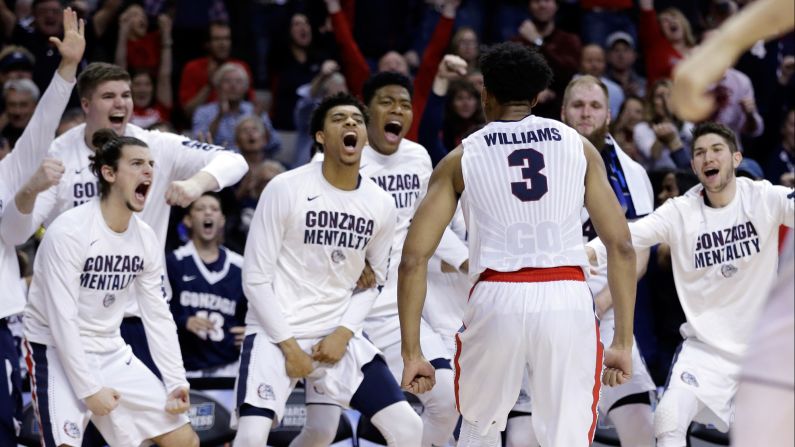 Gonzaga forward Johnathan Williams celebrates after dunking against Xavier during the second half of an NCAA Tournament regional final game on Saturday, March 25. The team advanced to their first Final Four.