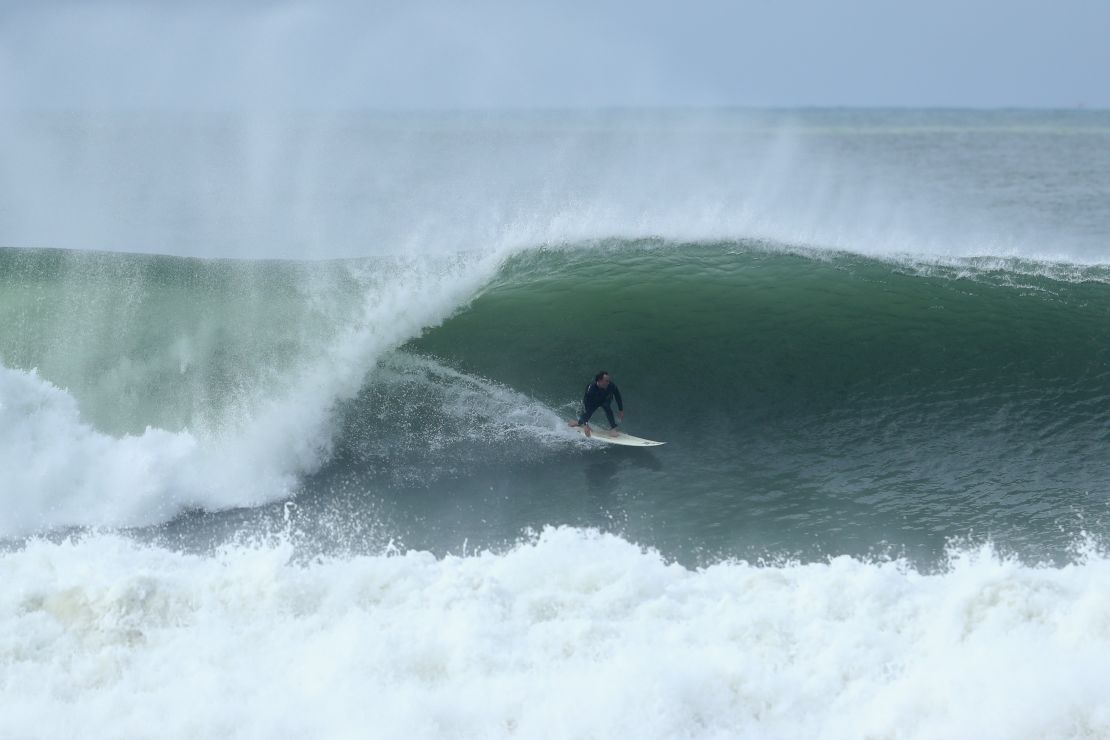 Narrabeen's a long beach where many waves break, including this rocky finish.