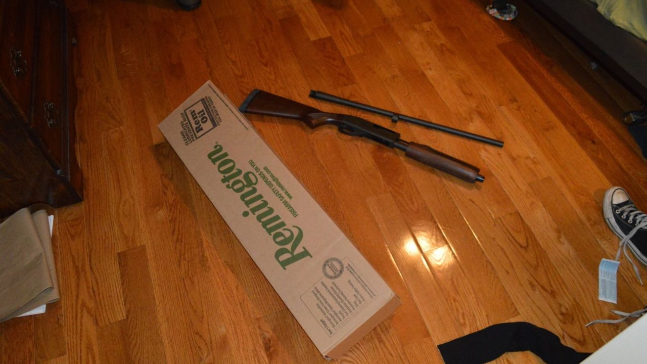 Police found a shotgun at the student's home.
