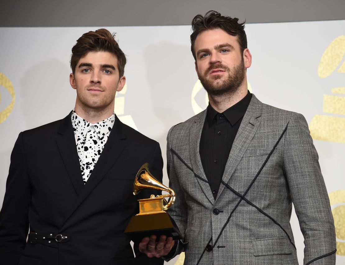 The Chainsmokers pose with the Best Dance Recording trophy at the 59th Annual Grammy music Awards on February 12, 2017, in Los Angeles, California.