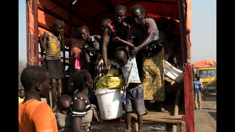 A Sudanese boy getting off a truck at Palorinya settlements.