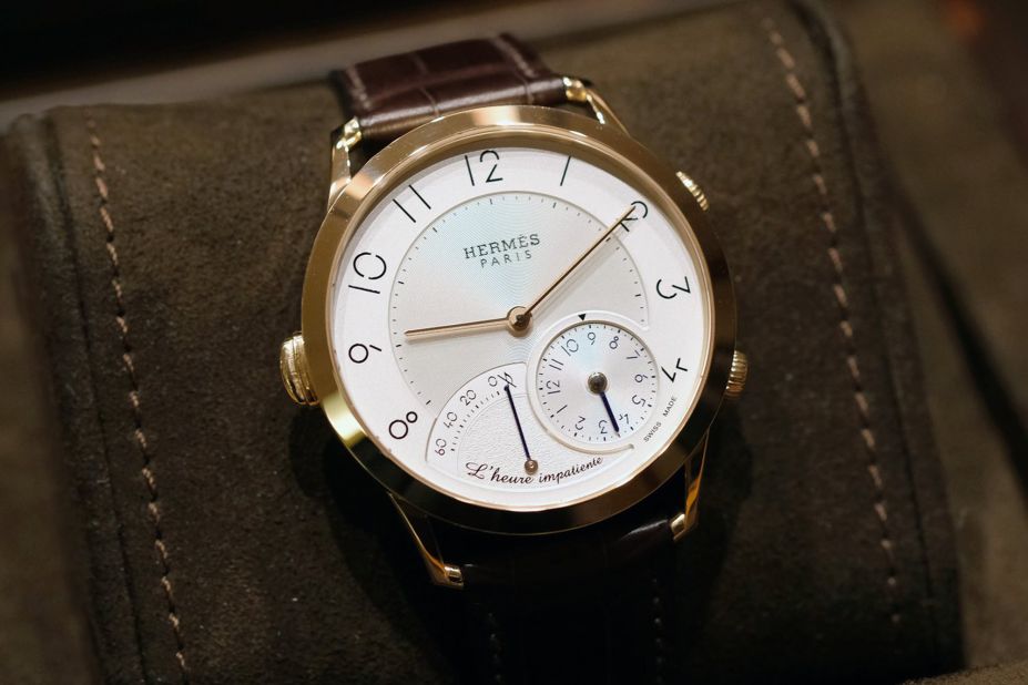 "This year, <a href="http://uk.hermes.com/watches/heure-h-1.html" target="_blank" target="_blank">Hermès</a> doubled down on the elegant Slim collection and released a stunning perpetual calendar with blue dial, and the less expected Heure Impatiente. The latter presents a unique take on the alarm complication, in order to highlight a special moment worth celebrating -- it is quite a poetic interpretation of time." -- <a href="https://www.hodinkee.com/articles/slim-dhermes-lheure-impatiente-introducing" target="_blank" target="_blank">Louis Westphalen</a>