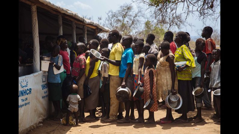 South Sudanese refugees line up for food at the Imvepi Reception Centre, Arua District, Northern Region, Uganda.