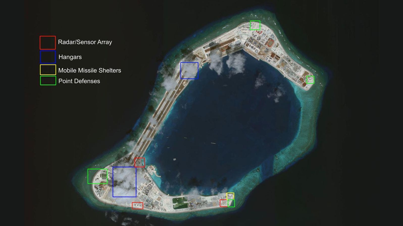 Subi Reef, taken on March 14, with new Chinese military infrastructure highlighted, courtesy of AMTI.