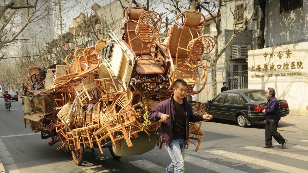 Street life is a form of kinetic sculpture in Shanghai.