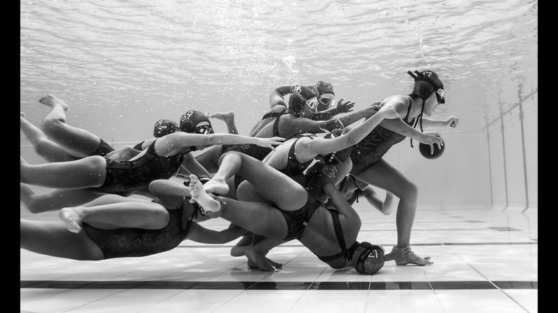 <strong>Submerged Field: </strong>Colombian photographer Camilo Diaz captured this moment during the European Junior Championship of Underwater Rugby in 2016. <strong> </strong>"The Colombian national team is immersed in white, gray, and black, fighting together for the ultimate position," says Diaz. "The volume of water suggests a calm while the surface gives constant chaos. It is in this scenario that the South American team is named youth world champion winners in Norway."<br />Copyright: © Camilo Diaz, Colombia, 1st Place, Open, Motion, 2017 Sony World Photography Awards
