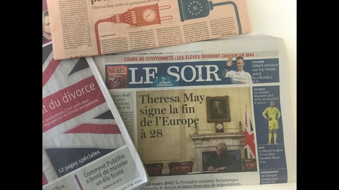 Belgian newspaper Le Soir shows Theresa May signing the letter formally to trigger Brexit.