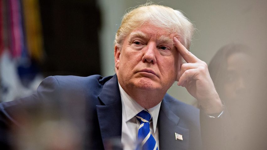 WASHINGTON, DC - MARCH 27:  U.S. President Donald Trump listens while meeting with women small business owners in the Roosevelt Room of the White House on March 27, 2017 in Washington, D.C.  Investors on Monday further unwound trades initiated in November resting on the idea that the election of Trump and a Republican Congress meant smooth passage of an agenda that featured business-friendly tax cuts and regulatory changes. (Photo by  Andrew Harrer/Pool/Getty Images)