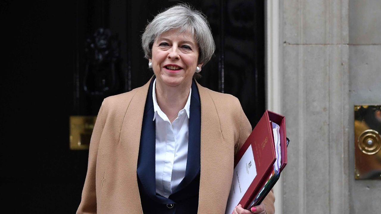 British Prime Minister Theresa May leaves 10 Downing Street before heading to the Houses of Parliament to attend the weekly Prime Minister's Questions (PMQs) in central London on March 29, 2017.
Britain formally launches the process for leaving the European Union on Wednesday, a historic step that has divided the country and thrown into question the future of the European unity project. / AFP PHOTO / Ben STANSALL        (Photo credit should read BEN STANSALL/AFP/Getty Images)