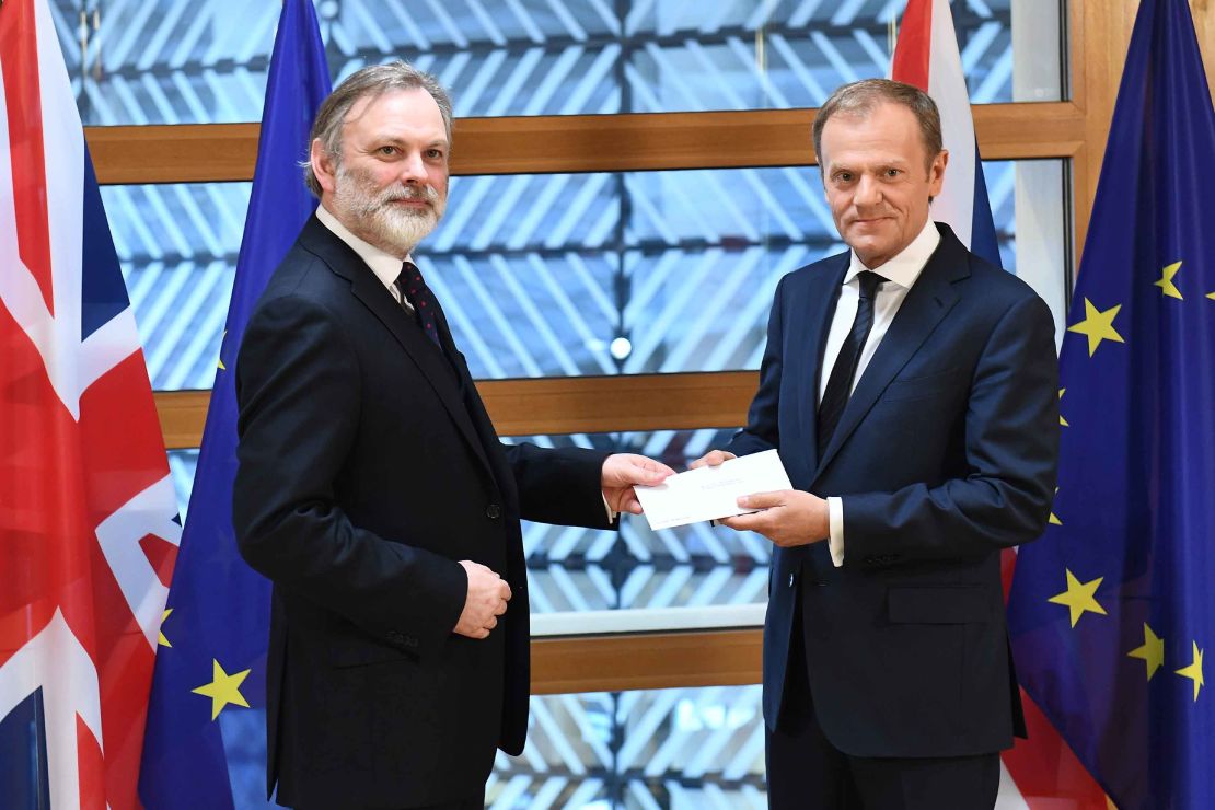 British ambassador to the EU, Sir Tim Barrow,  delivers the official Article 50 notice to European Council President Donald Tusk in Brussels.