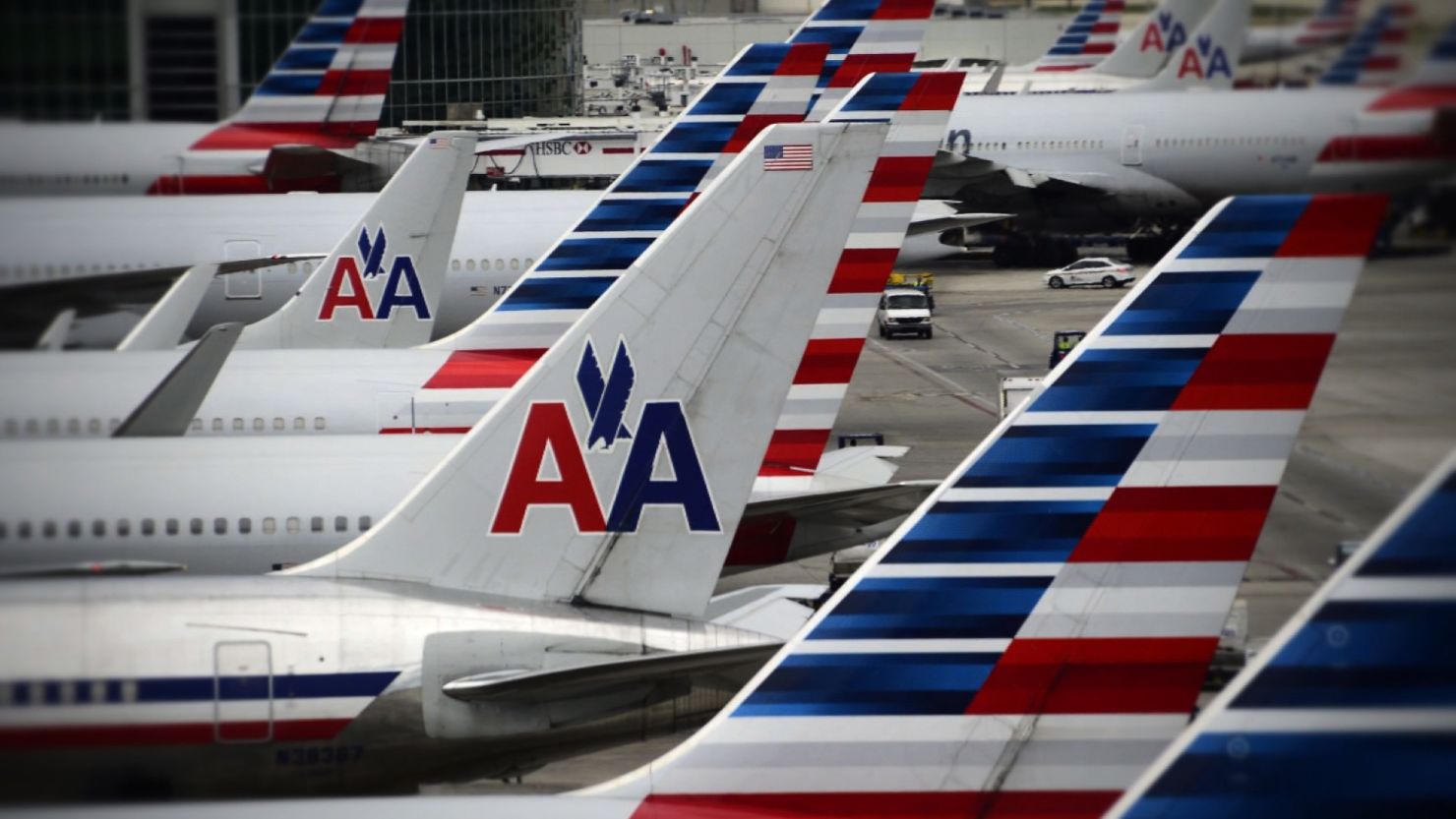 A woman is suing American Airlines over harassing text messages she says she received from an airline employee.