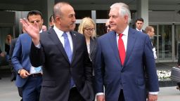 Turkey's Foreign Minister Mevlut Cavusoglu and US Secretary of State Rex Tillerson arrive for a meeting on March 30, 2017 in Ankara. Tillerson met Turkish leaders for talks clouded by differences over Syria, a day after Ankara announced the end of its military offensive there. 