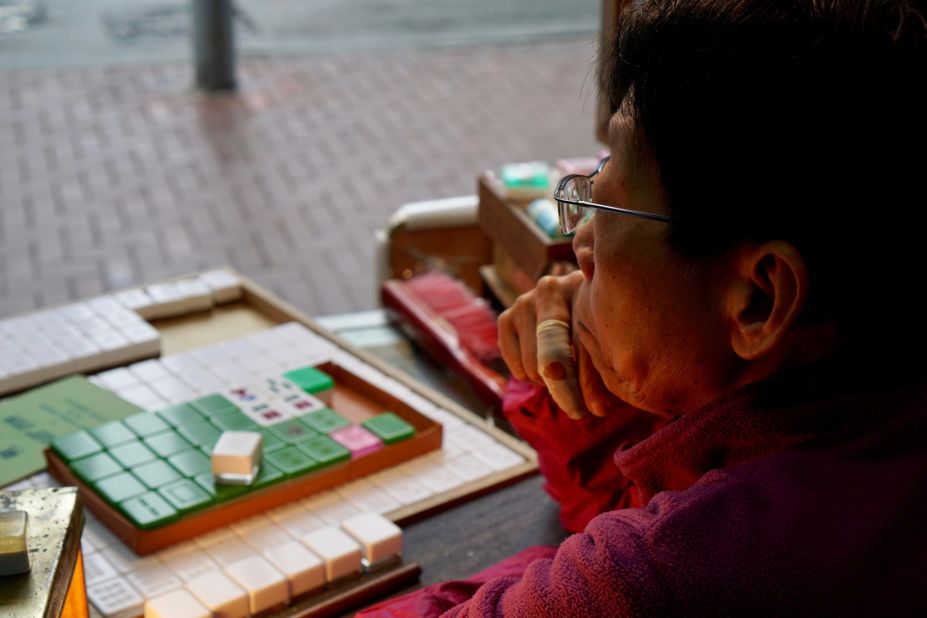 <strong>Kam Fat Mahjong: </strong>Tucked away in Hung Hom, Kam Fat Mahjong shop is a narrow, open-air space. There's not much to it, aside from a small work desk.