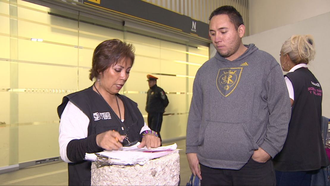 Social worker Celia Anaya tells David Padilla, a deportee who's just arrived from the United States, about government unemployment benefits in Mexico.