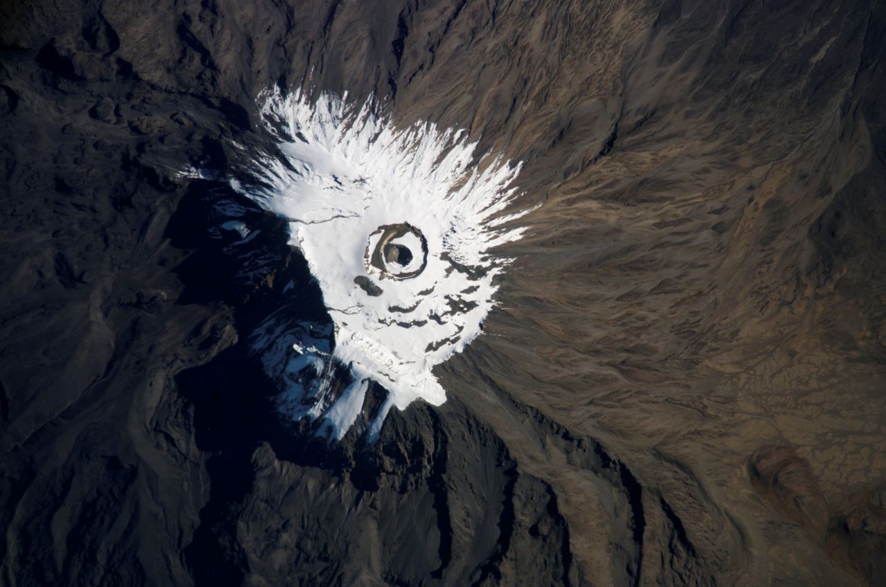 A crew member on the International Space Station captured this image of Mount Kilimanjaro, Tanzania, covered in snow and ice in 2007.