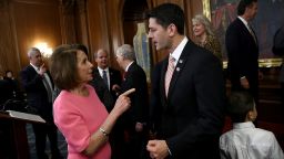 U.S. Speaker of the House Paul Ryan (R) (R-WI) speaks with House Minority Leader Rep. Nancy Pelosi (D-CA) following an event marking the passage of the 21st Century Cures Act at the U.S. Capitol December 8, 2016 in Washington, DC. The bill, passed with strong bipartisan support, provides funding for cancer research, the fight against the epidemic of opioid abuse, mental health treatment, aids the Food and Drug Administration in expediting drug approvals and pushes for better use of technology in medicine.