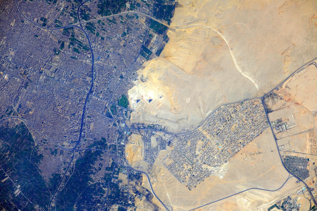 The pyramids at Giza can be seen in the center of this image taken from the International Space Station in 2012, with the modern Cairo metropolitan area to the left and the Sahara desert on the right. <strong>Scroll through the gallery for more photos of the continent taken from space.</strong>