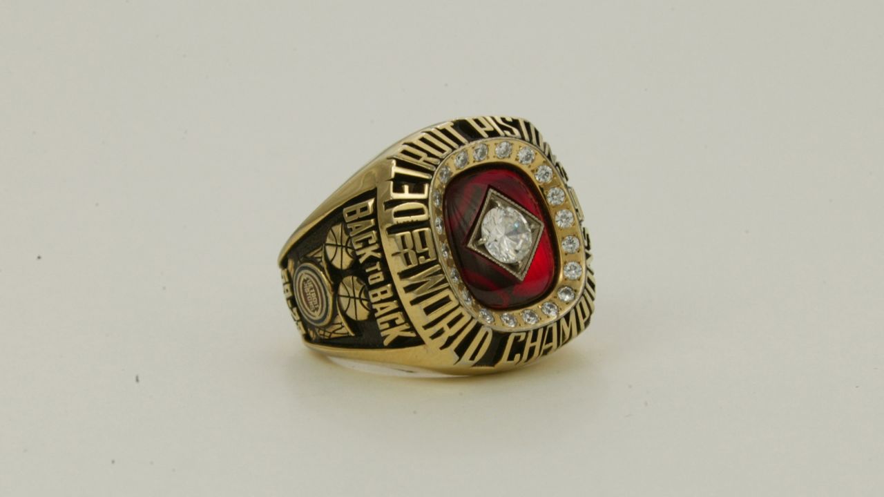 The ring for the 1989-90 Detroit Pistons featured a large diamond surrounded by 20 smaller diamonds. On the side of the ring are the words "back to back" -- signifying the team's consecutive championships.