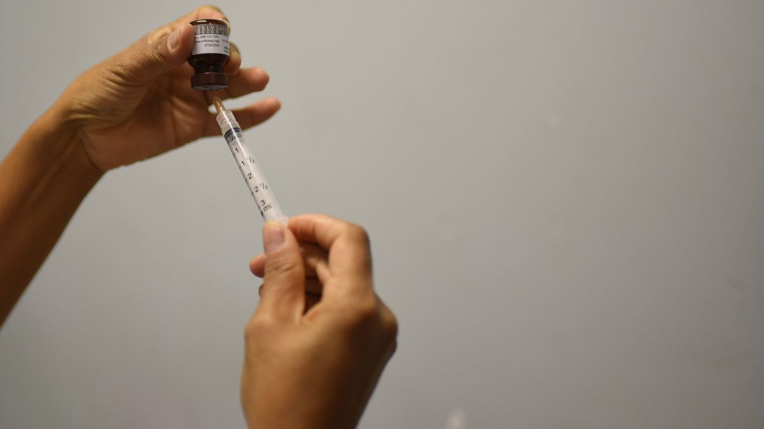 Countries where outbreaks are more likely to occur also have fewer doctors and nurses to treat the population. Most have left for better prospects elsewhere. Here a nurse administers a yellow fever vaccine in Rio de Janeiro, Brazil.