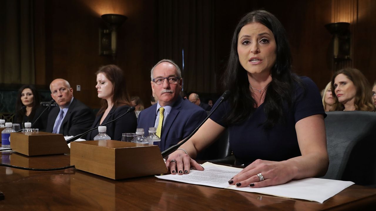 Former Olympic gold medalist Dominique Moceanu, right, testifies before the Senate Judiciary Committee on Tuesday, March 28. USA Gymnastics is a defendant <a href="http://www.cnn.com/2017/03/16/health/usa-gymnastics-ceo-resigns/" target="_blank">in a federal lawsuit</a> that accuses Dr. Larry Nassar, a former volunteer physician, of sexually assaulting 18 women during physical examinations. The lawsuit alleges that USA Gymnastics was negligent in allowing the abuse to occur. When the lawsuit was filed, USA Gymnastics said it was appalled by the allegations and that it notified the FBI as soon as it learned of athletes' concerns. Nassar has pleaded not guilty to criminal charges. Moceanu told the committee she wasn't abused by Nassar, but "everybody around us knew that abuses were going on."