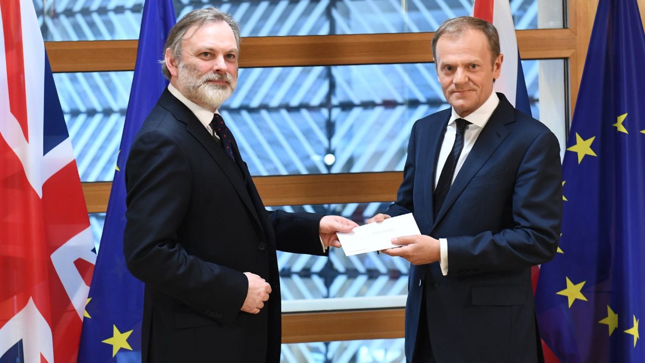 Tim Barrow, the British ambassador to the European Union, delivers an official notice to European Council President Donald Tusk, right, as <a href="http://www.cnn.com/2017/03/29/europe/article-50-brexit-theresa-may-eu/index.html" target="_blank">the United Kingdom begins the formal process of leaving the EU</a> on Wednesday, March 29.