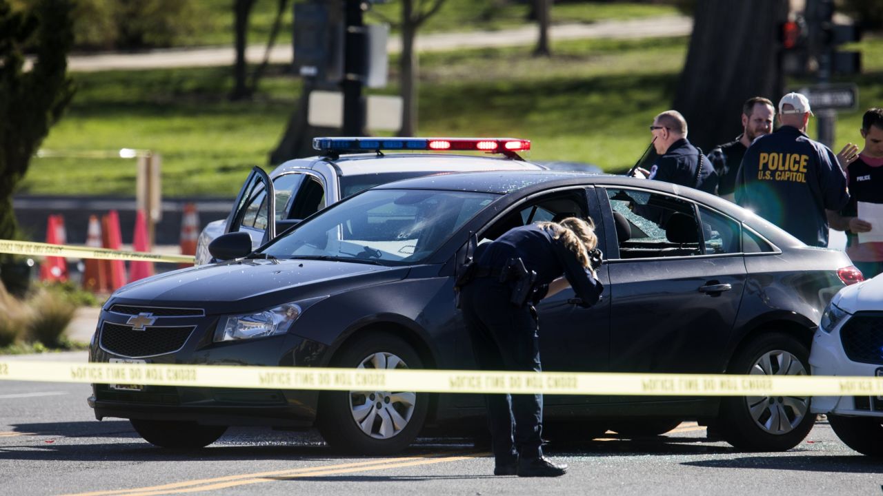 Police surround a car that authorities say <a href="http://www.cnn.com/2017/03/29/politics/capitol-building-driver/" target="_blank">nearly struck Capitol Police officers</a> in Washington on Wednesday, March 29. The driver was taken into custody and charged with several crimes, including seven counts of assault on a police officer. 