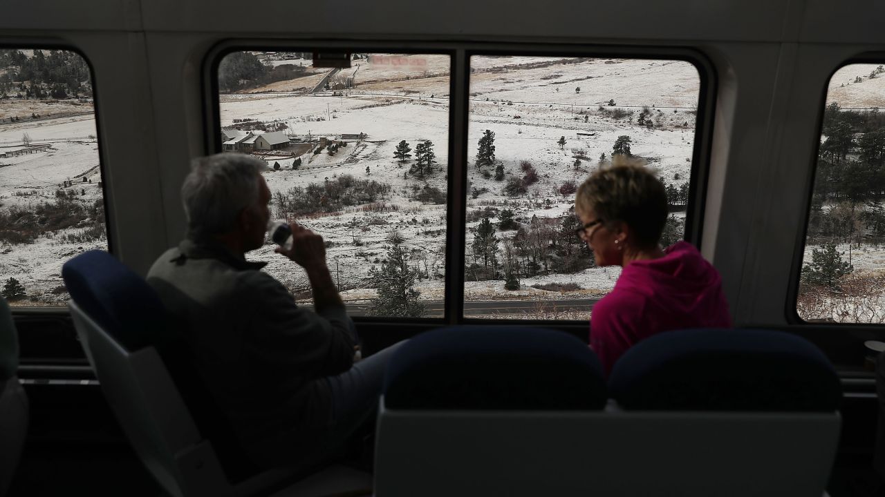Passengers enjoy views of Denver as they ride on Amtrak's California Zephyr on Friday, March 24. The train's route runs from Chicago to the San Francisco Bay.