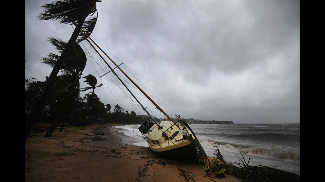 A boat is washed ashore at Airlie Beach in Queensland, Australia, on Wednesday, March 29. Northeastern Australia is still dealing with <a href="http://www.cnn.com/2017/03/30/asia/australia-cyclone-debbie-shark-flooding/" target="_blank">the aftermath of Cyclone Debbie,</a> which swept across the Queensland coast and caused widespread damage. 