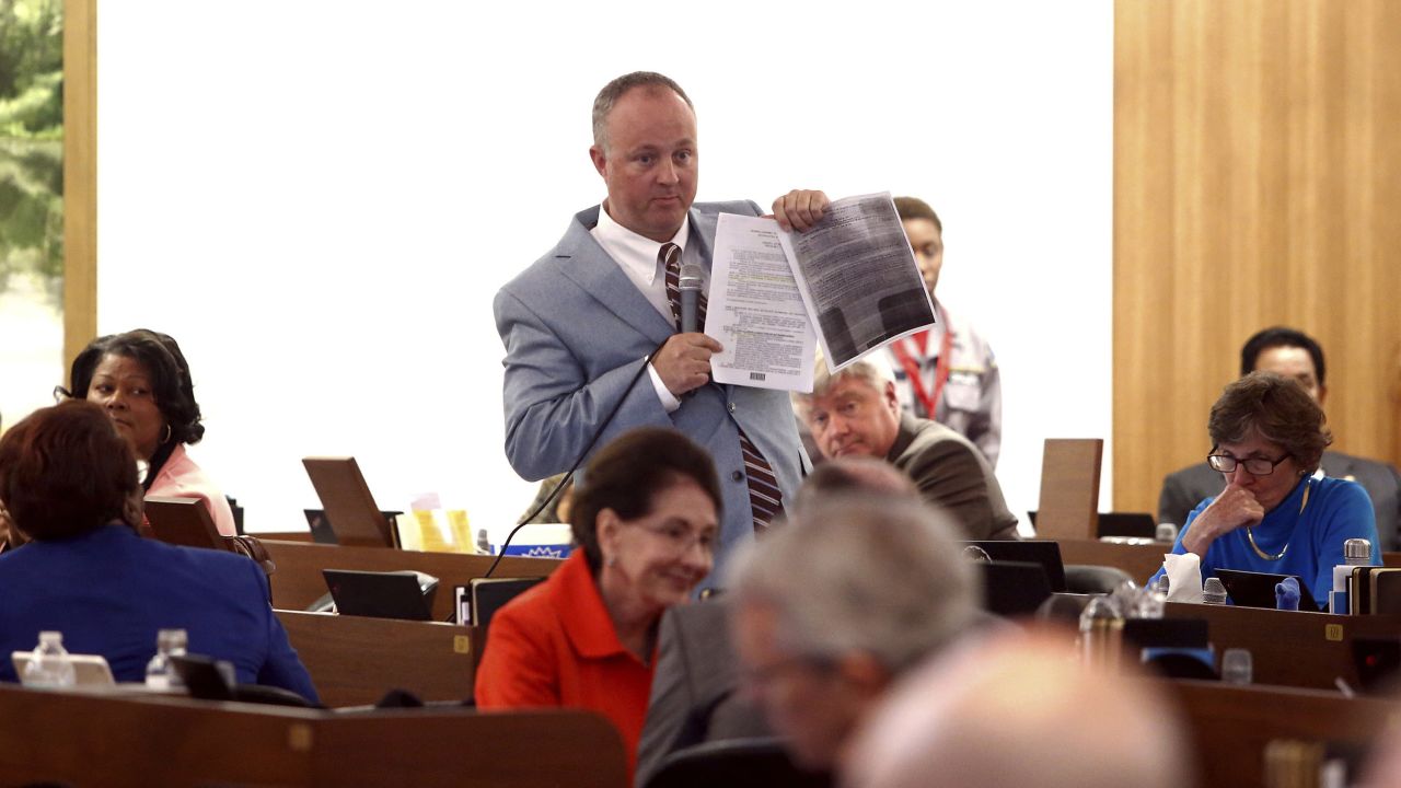 North Carolina House Minority Leader Darren Jackson holds a copy of House Bill 2, the state's controversial bathroom law, during a House floor debate on Thursday, March 30. <a href="http://www.cnn.com/2017/03/30/politics/north-carolina-hb2-agreement/" target="_blank">Lawmakers later passed a bill</a> to repeal HB2, which required people at a government-run facility to use bathrooms and locker rooms that correspond to the gender on their birth certificate.