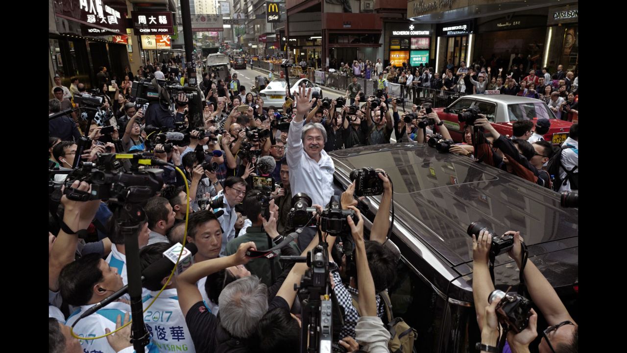 John Tsang, a candidate for chief executive in Hong Kong, waves to supporters on Friday, March 24. <a href="http://www.cnn.com/2017/03/25/asia/hong-kong-chief-executive/" target="_blank">He finished second</a> to Carrie Lam, however, in a race decided by an election committee drawn mostly from Hong Kong's elite. <a href="http://www.cnn.com/2017/03/23/world/gallery/week-in-photos-0324/index.html" target="_blank">See last week in 28 photos</a>