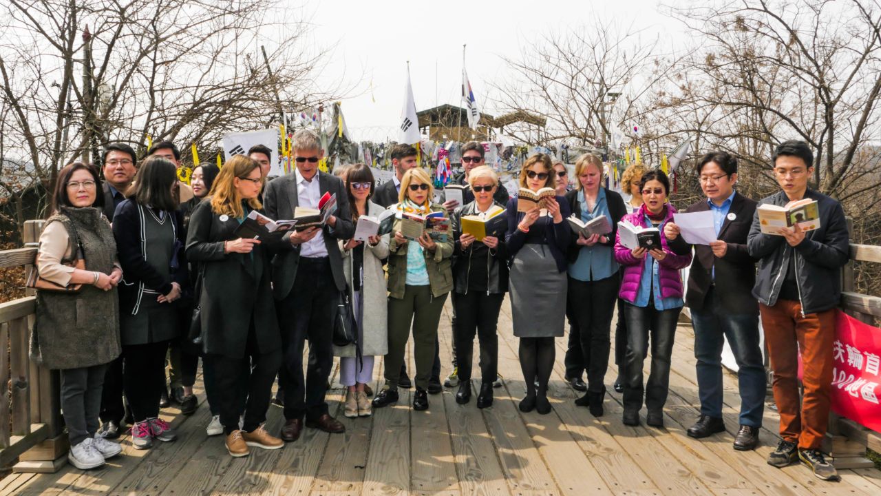 Publishers and literary agents read a passage from "The Accusation," a collection of short stories by a North Korean writer who is still living in North Korea.