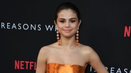 Actress and singer Selena Gomez arrives for the premiere Of Netflix's '13 Reasons Why' at Paramount Pictures Studio in Los Angeles, California on March 30, 2017.