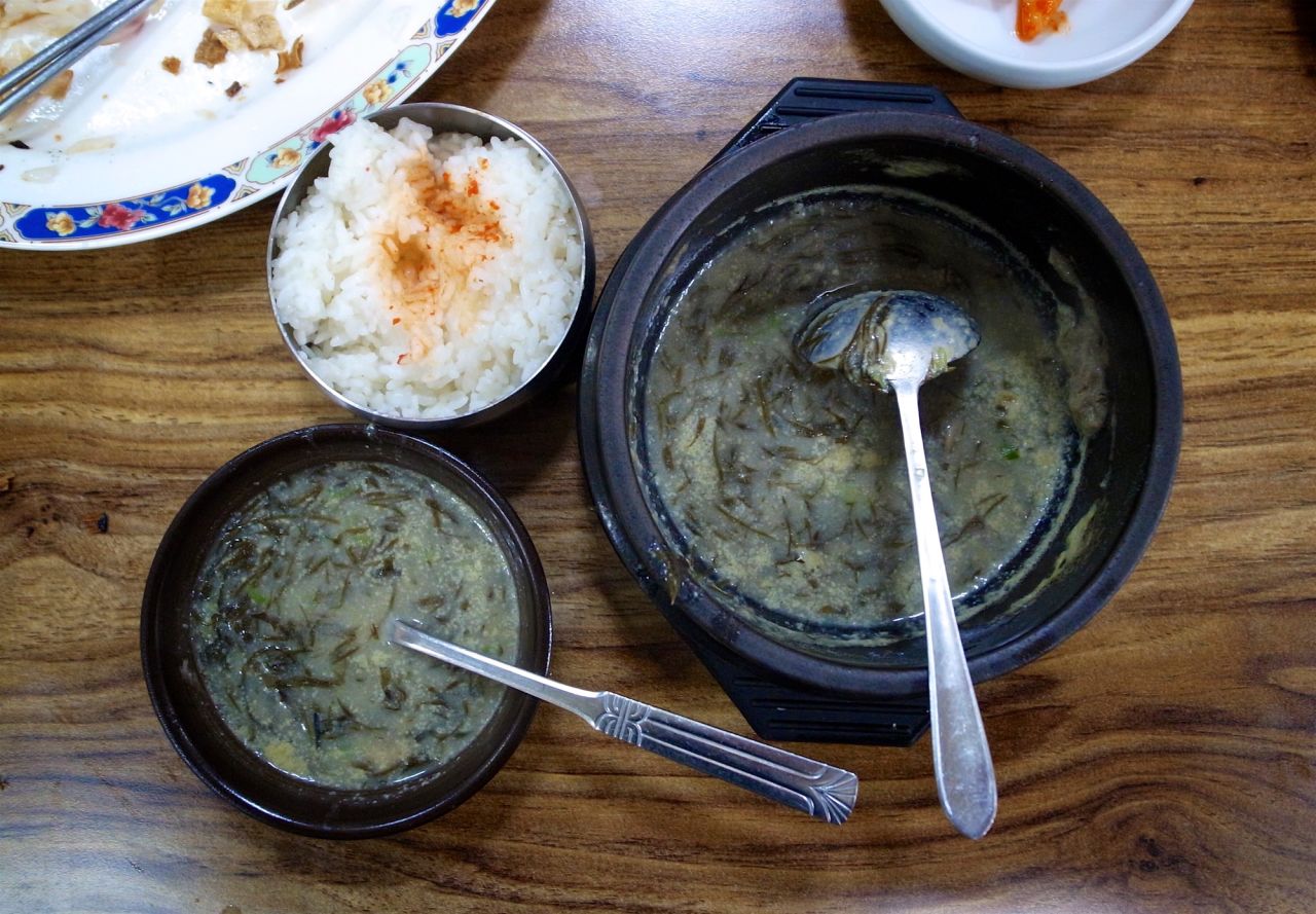<strong>The food of Jeju island:</strong> The food of Jeju island, off the southern coast, is quite different from that found on the mainland. Holliday recommends mom-guk -- a simple pork and seaweed soup.                                       