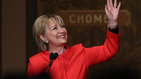 Former Secretary of State Hillary Clinton waves to students and guests while receiving a standing ovation before delivering remarks at Georgetown University on March 31, 2017 in Washington, DC.