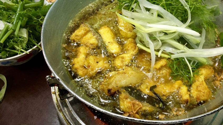 There's a street in Hanoi that's entirely dedicated to  chả cá --  a vermicelli noodle dish with turmeric-spiced catfish that diners grill themselves. The street's most famous address is Chả Cá Lã Vọng, which has been open for more than a century. 

