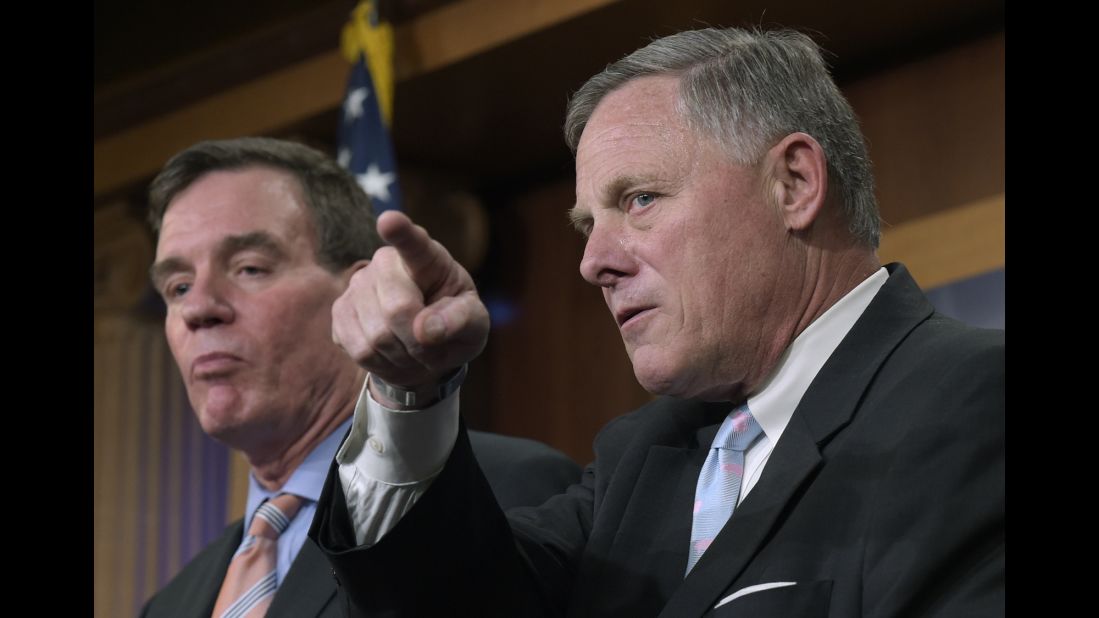 US Sen. Richard Burr, chairman of the Senate Intelligence Committee, points to a reporter during a news conference in Washington on Wednesday, March 29. The Senate is also conducting a Russia investigation, but unlike the House it has not stalled along partisan lines. Burr and Sen. Mark Warner, the top Democrat on the committee, were laughing, smiling and generally collegial during <a href="http://www.cnn.com/2017/03/29/politics/senate-russia-investigation-comparison/" target="_blank">Wednesday's news conference</a> when they announced they have 20 witnesses they plan to interview.